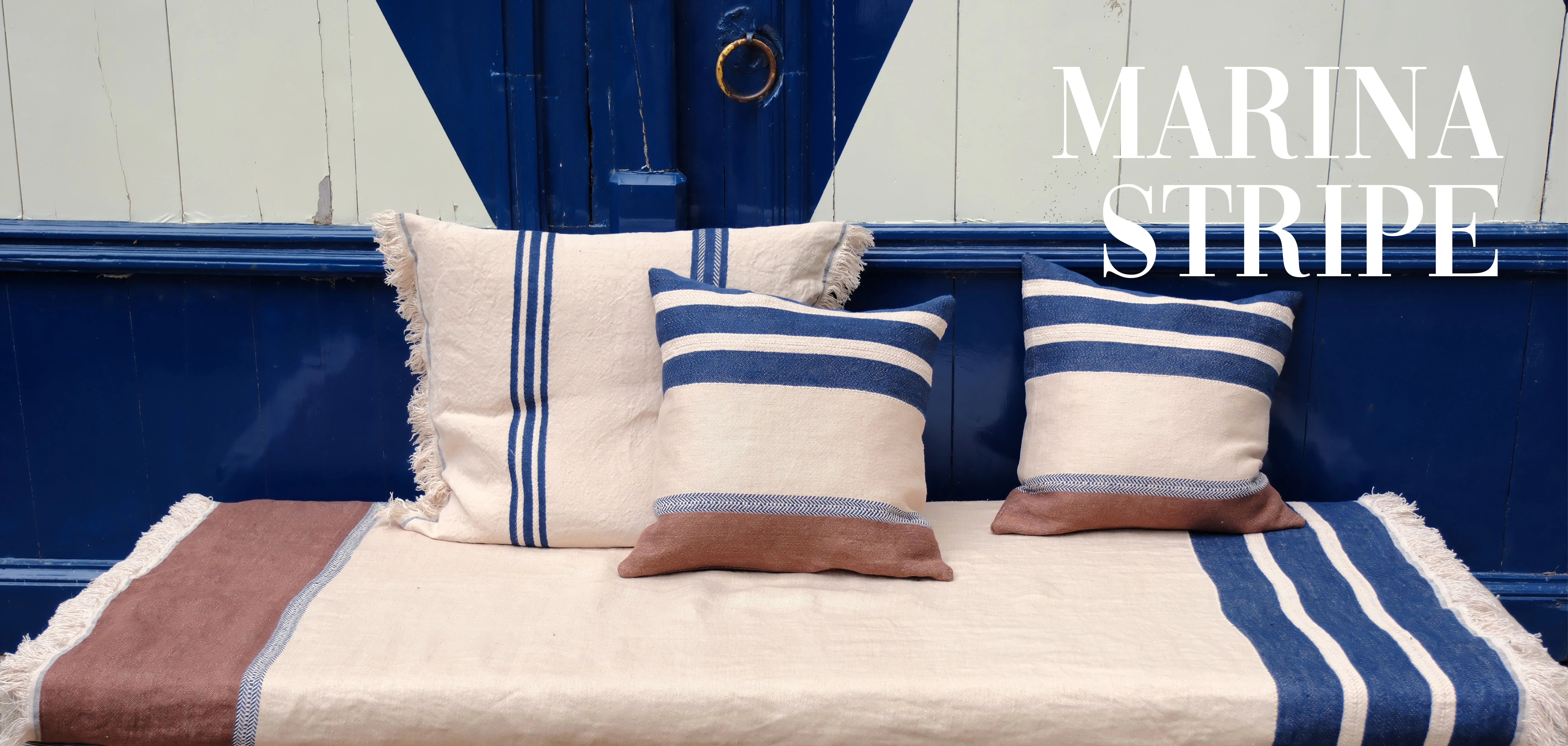 Marina Stripe from the Blue Diamond Beauty collection by Libeco Home, featuring textured Belgian linen stripes in indigo, sienna brown and off-white.